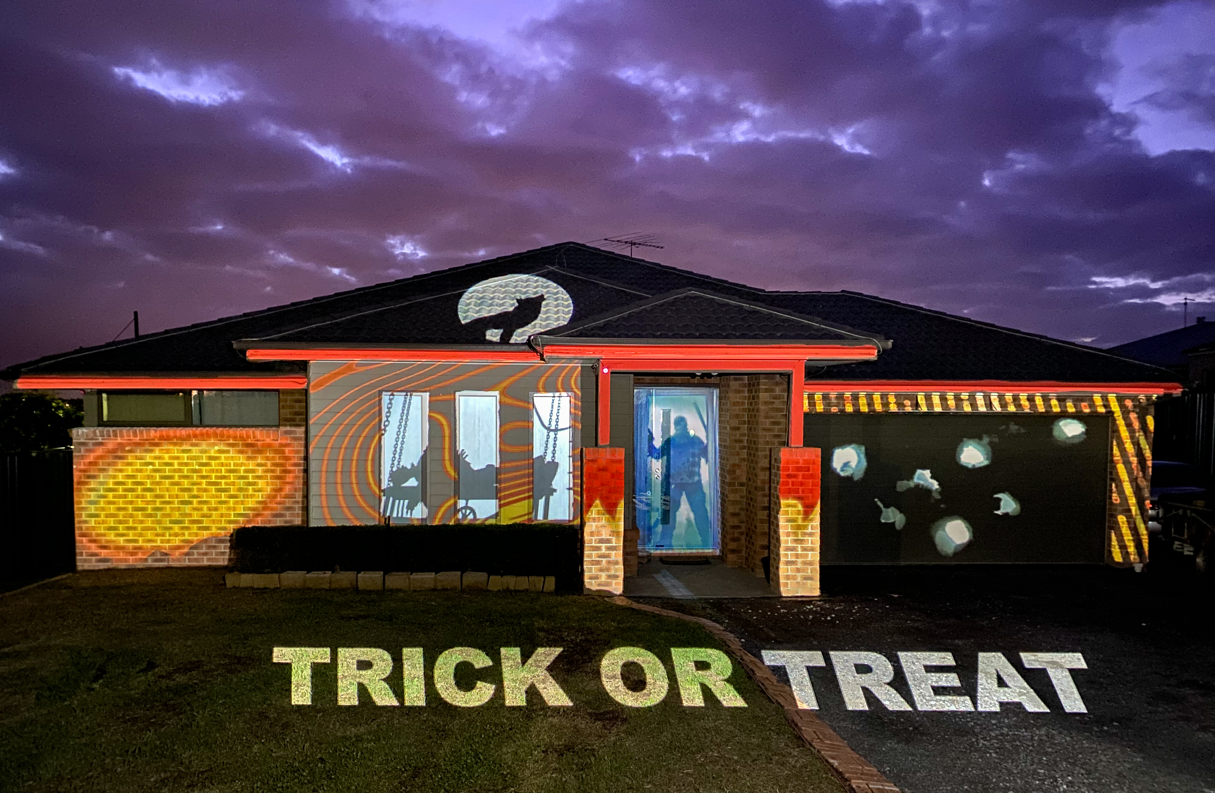 Halloween projection mapping on a house using the LFC Kit with the Optoma W460ST Projector.